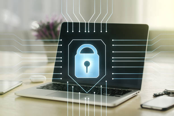 istock Double exposure of creative lock hologram with chip on laptop background. Information security concept 1471815520