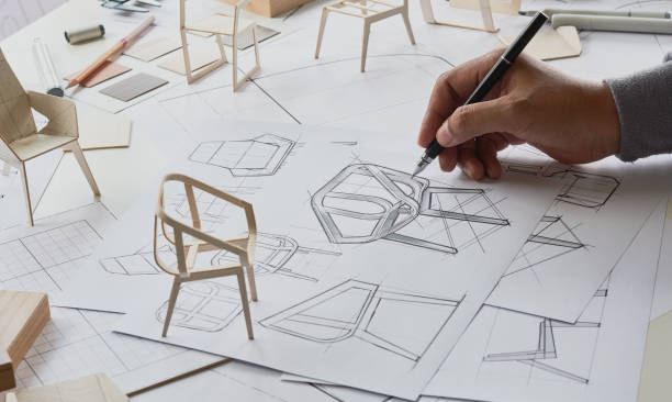 istock Designer sketching drawing design development product plan draft chair armchair Wingback Interior furniture prototype manufacturing production. designer studio concept . 1471817703
