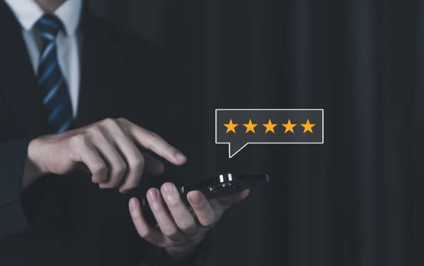 istock Customers review for five stars via smartphone. The best service 1471819082