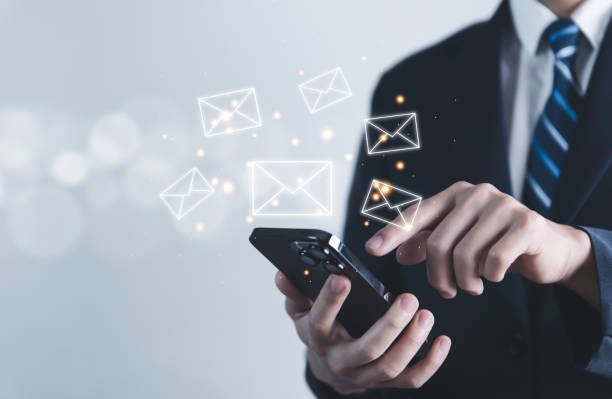 istock Businesses send emails from smartphones. Electronic mail concepts are online communication. 1471819098