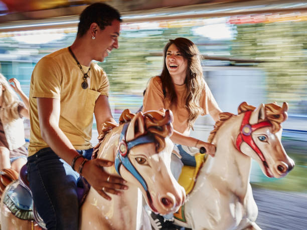 istock Merry-go-round carousel ride in blurred motion! 1471820177