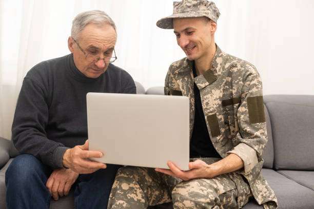 istock an elderly father and a military son 1471820974