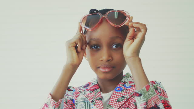 Cute African girl with sunglasses