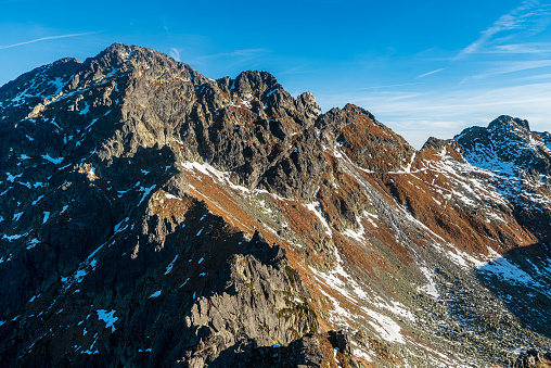 Amazing scenery of Sweinica, Zawrat and Zmarzle Czuby mountain peaks in autumn Tatra mountains