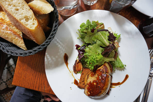 istock Close up pan seared Foie Gras served with crispy ginger bread toast and green balsamic salad 1471825393