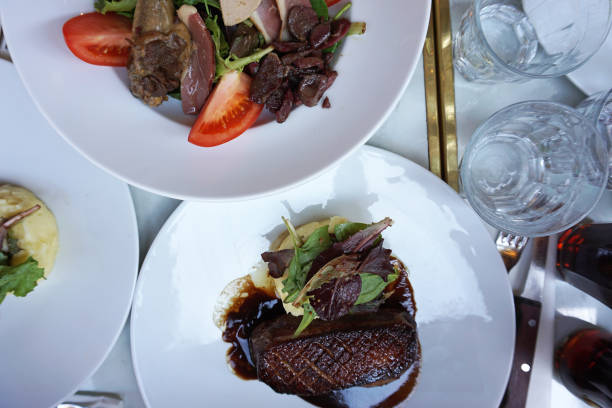 istock Close up pan seared Foie Gras served with crispy ginger bread toast and green balsamic salad 1471825604