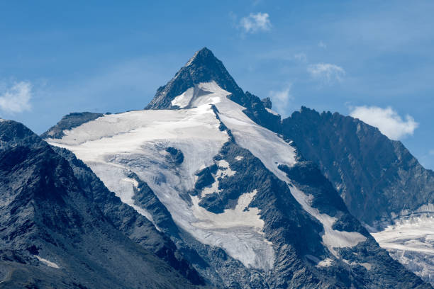 istock Mountain peak with a melting glacier 1471835227