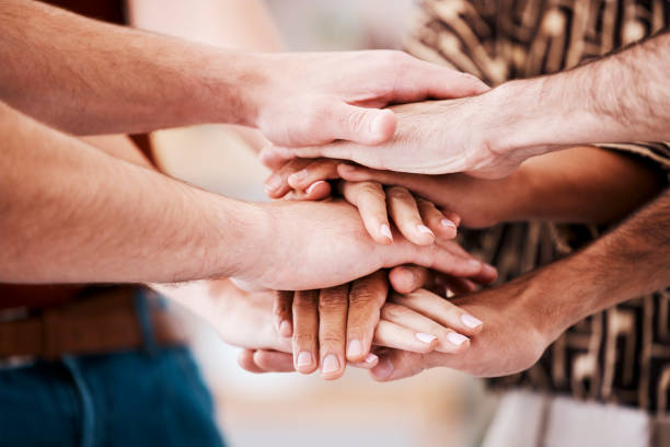 istock Hands, team building and employee teamwork with business community support, diversity collaboration or motivation together. Corporate unity, staff solidarity or creative startup workforce cooperation 1471837031