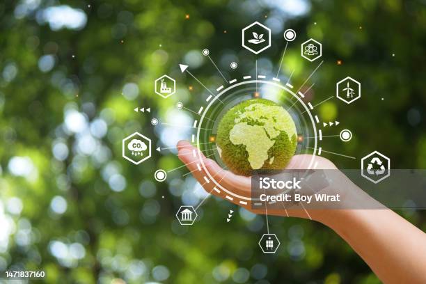 Hand Of Human Holding Green Earth With The Icon Of Environment For Esg Co2 And Net Zeroworld Sustainable Environment Concept Stock Photo - Download Image Now
