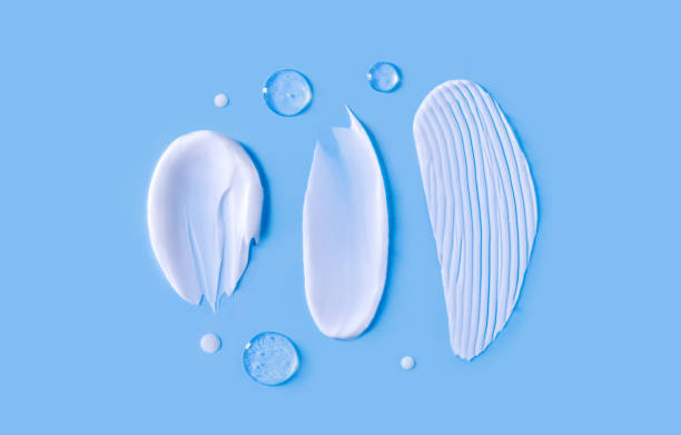 istock cosmetic smears cream texture on blue background 1471842553
