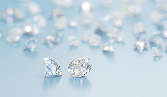 Grupo de diamantes colocados sobre fondo brillante 3d Rendering Soft Focus photo