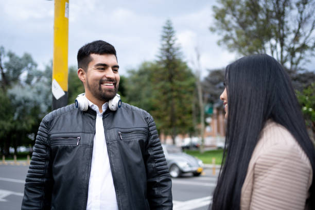 istock Young man talking with his girlfriend outdoors 1471848631