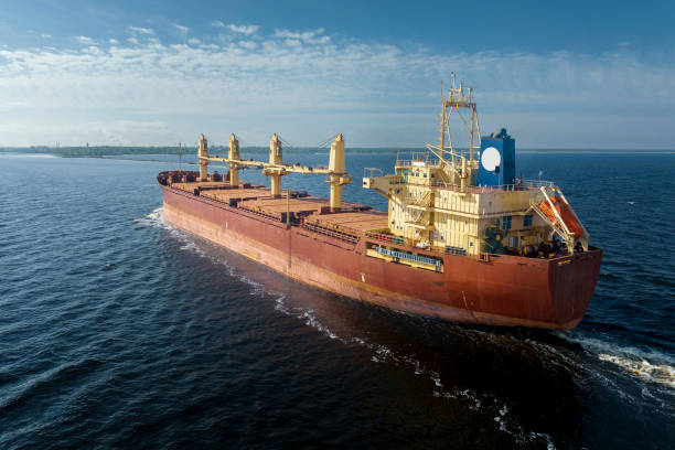 istock Large empty cargo ship in the sea during sunny summer day 1471854139
