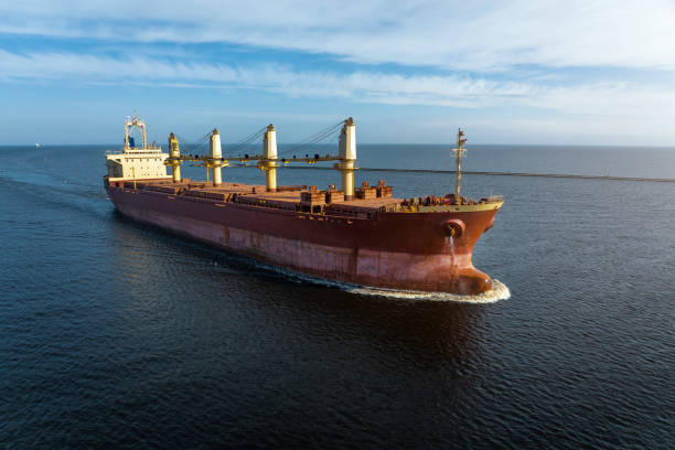 istock Large empty cargo ship in the sea during sunny summer day 1471854171