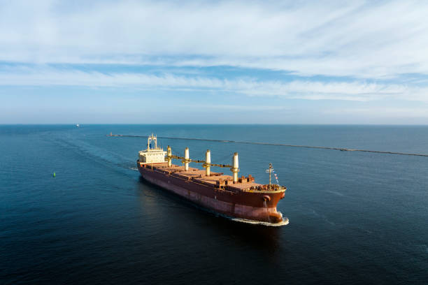 istock Large empty cargo ship in the sea during sunny summer day 1471854190