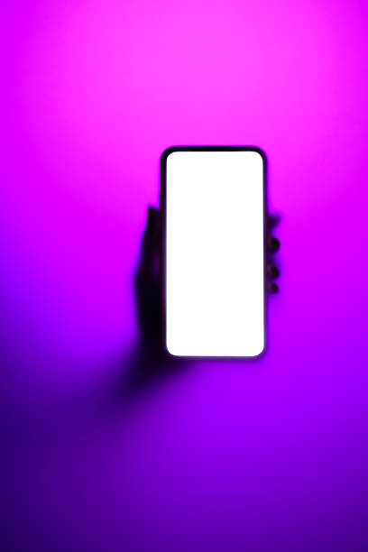 istock Phone in hand in neon fog 1471855281