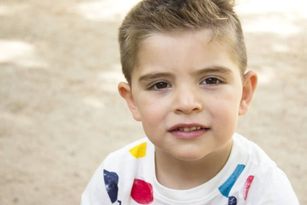 istock Portrait of four year old boy gesturing 1471856781