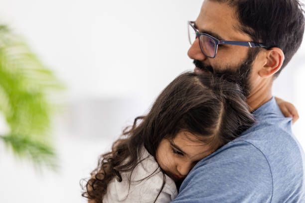 istock Father Consoling His Young Daughter 1471859356