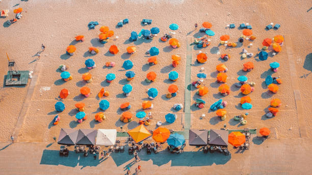 istock beach crowd and shades 1471863591