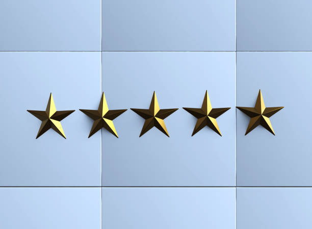Five golden stars on tile wall