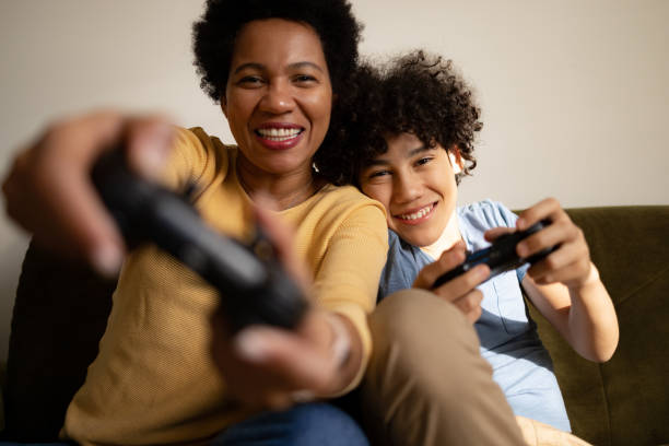 istock Enjoying in video games at home! 1471870583