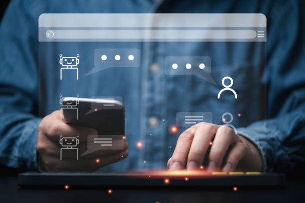 istock Businessman using smartphone and laptop keyboard to chat with AI or Artificial Intelligence for chatbot by Open AI concept. 1471870684