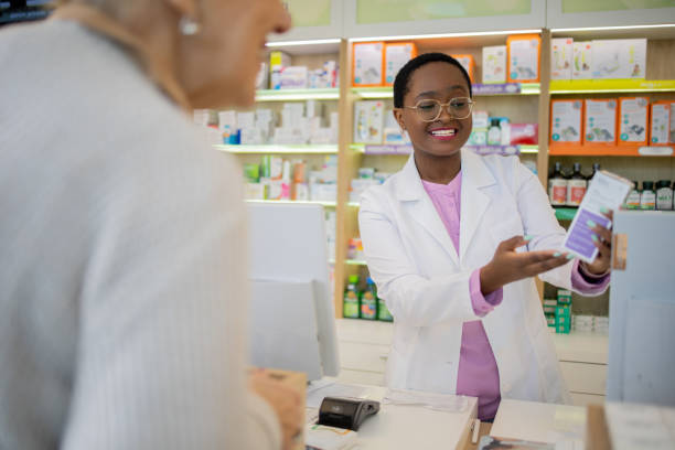 istock Senior woman at the pharmacy 1471871325