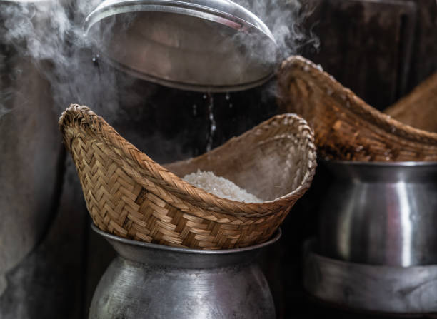 istock Cook rice with pot and rice steamer 1471875336