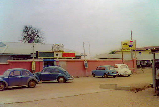 Bolgatanga, Ghana - Sept 1958: Cars outside the Black Star Hotel in Bolgatanga, Ghana c.1958