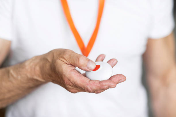 istock Unrecognizable senior man pushing panic button on emergency equipment 1471882969