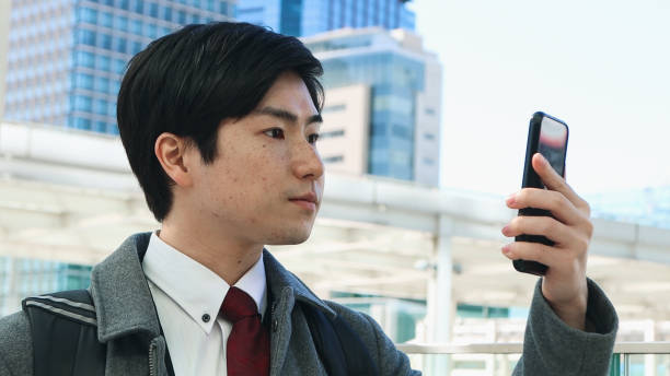 istock Young Business Man Using A Phone In Outdoors 1471888560