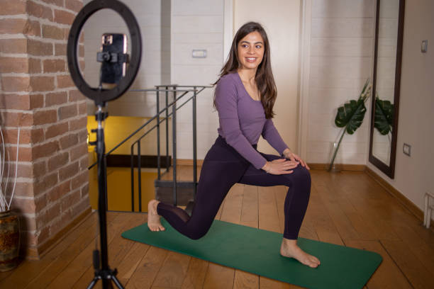 istock Woman is recording a vlog about exercise 1471889191