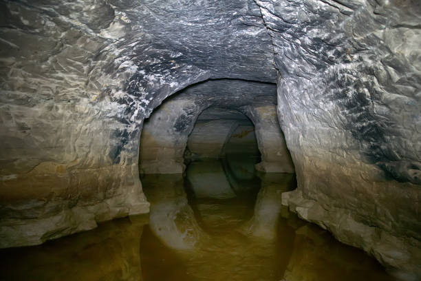 istock partially flooded underground caves catacomb. 1471891912