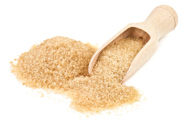 istock Brown sugar with scoop on white 1471894462