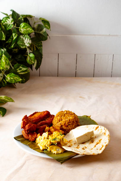istock Breakfast in colombia with cornbread, cheese, eggs, beans and pork 1471901057