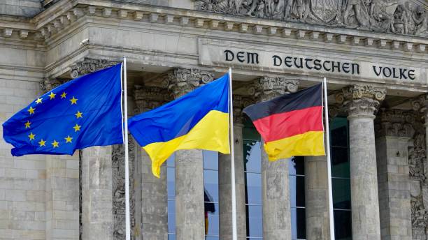 istock Ukraine, European and German Flag 1471901333