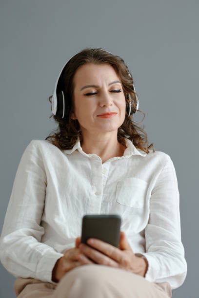 istock Woman Enjoying Good Music 1471902154