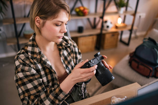 istock Young photographer working at her home office. 1471903021