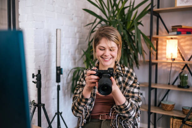 istock Young photographer working at her home office. 1471903747