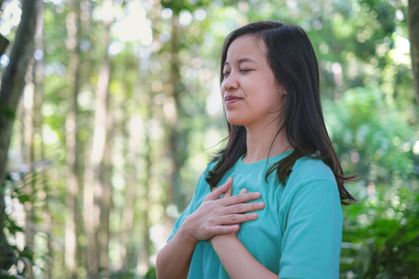 istock Serene Asian Woman Meditating 1471904118