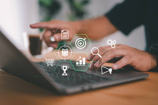 istock Marketing plan for target customer: buyer persona, behavior, personalization, customer-centric. Businessman uses laptop to target customer. 1471904173