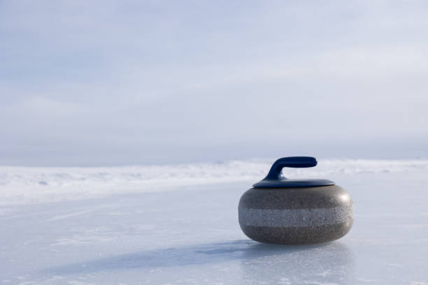 istock One curling rock on ice outdoors 1471908149
