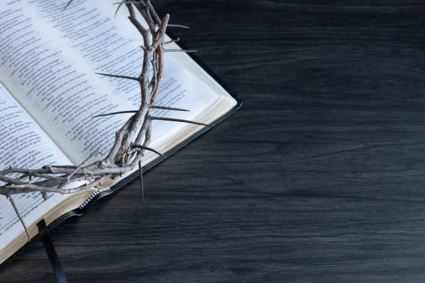 istock Crown of thorns on open bible 1471908524
