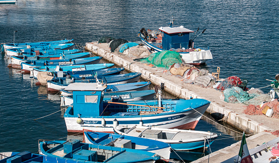 Gallipoli, Italy. 06 30 2019. Professional artisanal fishing boats and their fishing gear.