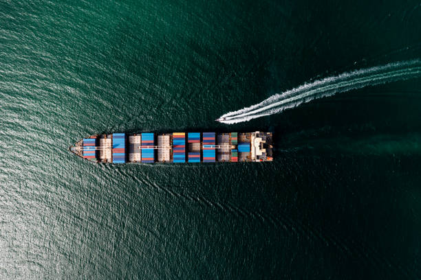 istock container cargo ship sailing full speed in pacific ocean to transport goods import export internationally or worldwide as business and industrial transport and marine services open sea aerial top view from drone 1471913422