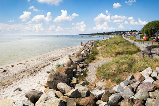 Pier and beach in Puck on the Bay of Puck at summer. Poland