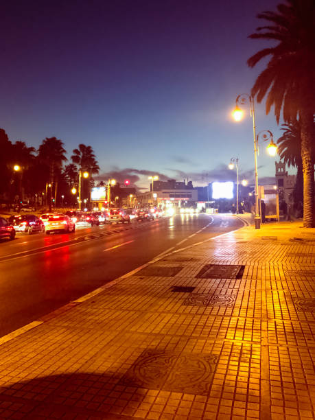 istock Nighttime beauty on the road sidewalk and lighting 1471915177