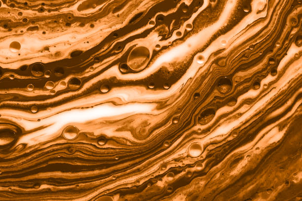 Abstract background with motion blurred lines in brown tones.