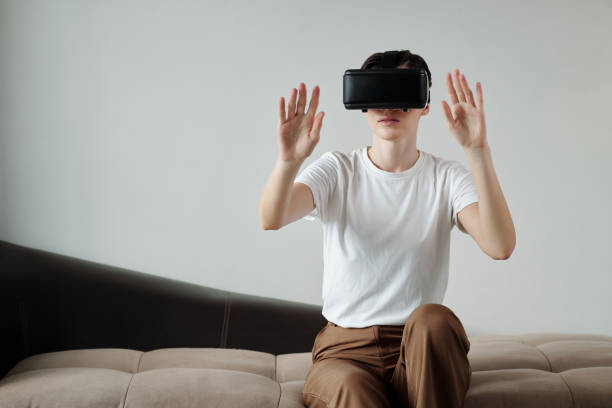 istock Woman Playing VR Game 1471916861