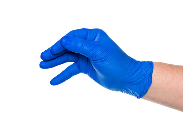 istock Isolated hand in medical latex glove 1471919821